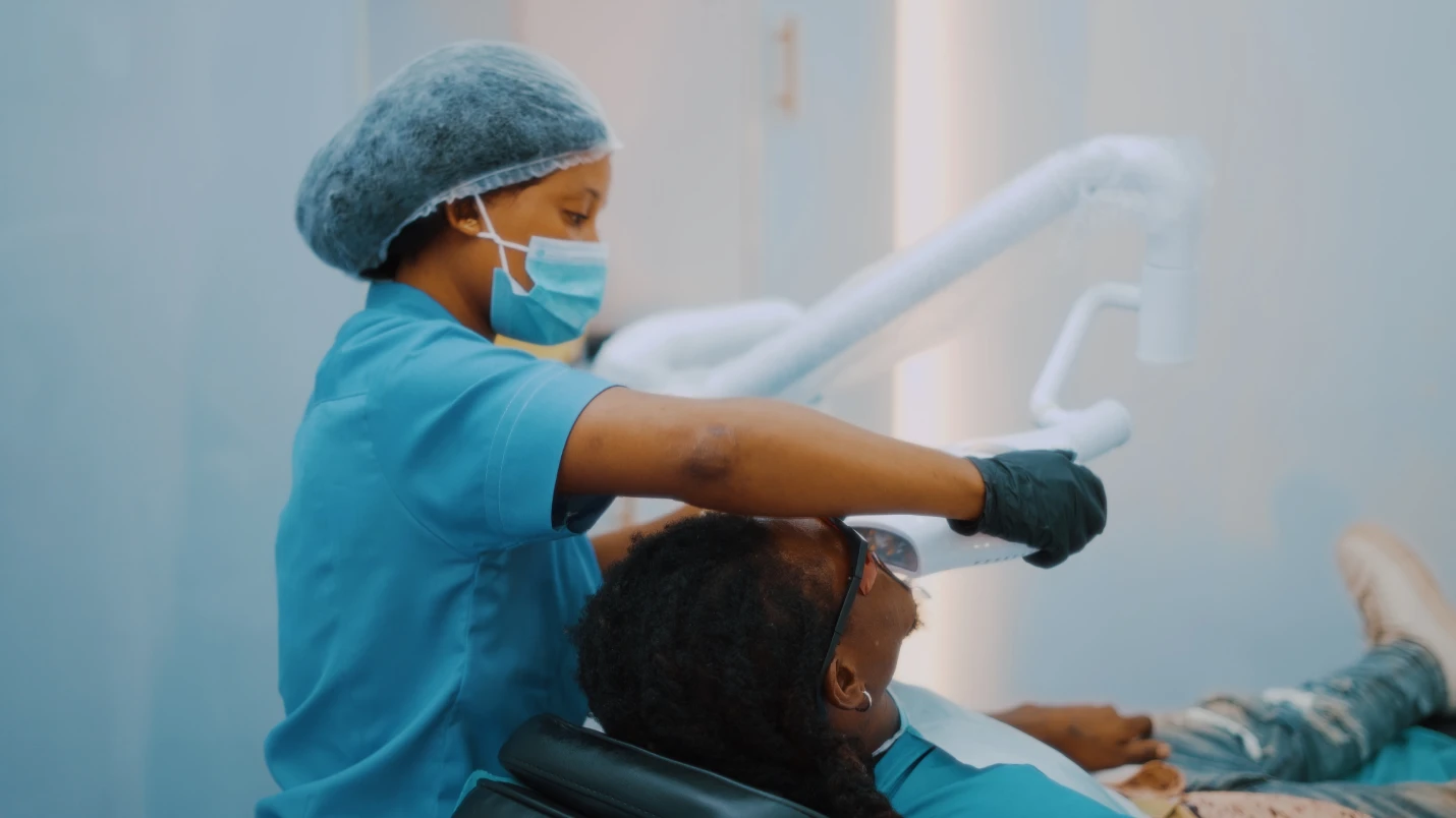 Patient getting X-Rays on their teeth.